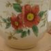 This shows the front details of the flowers as well as the details of the saucer., This shows the front details of the flowers as well as the details of the saucer.,